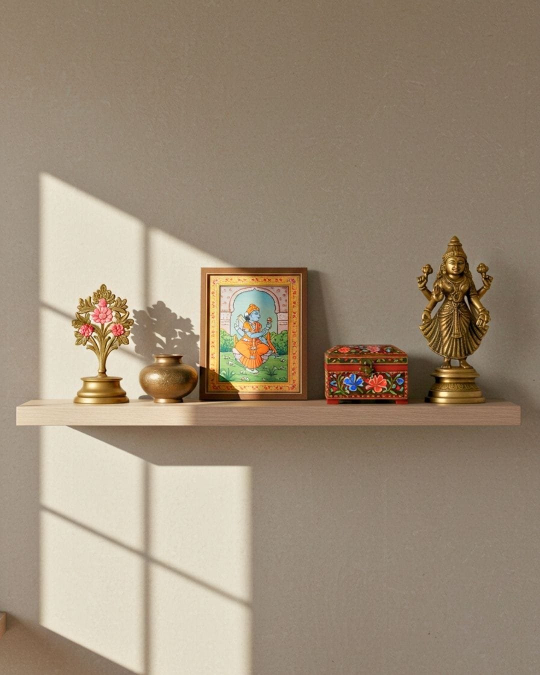 Modern Indian Minimalism: 2025 Interior Design Trend 7 A minimalist shelf with a few carefully chosen Indian art pieces and decorative objects